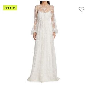 Dreamy ML MONIQUE LHUILLIER
Embroidered Tulle Long Sleeve Gown​
